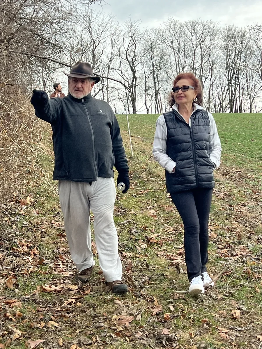 Phil Liskey walking on farmland